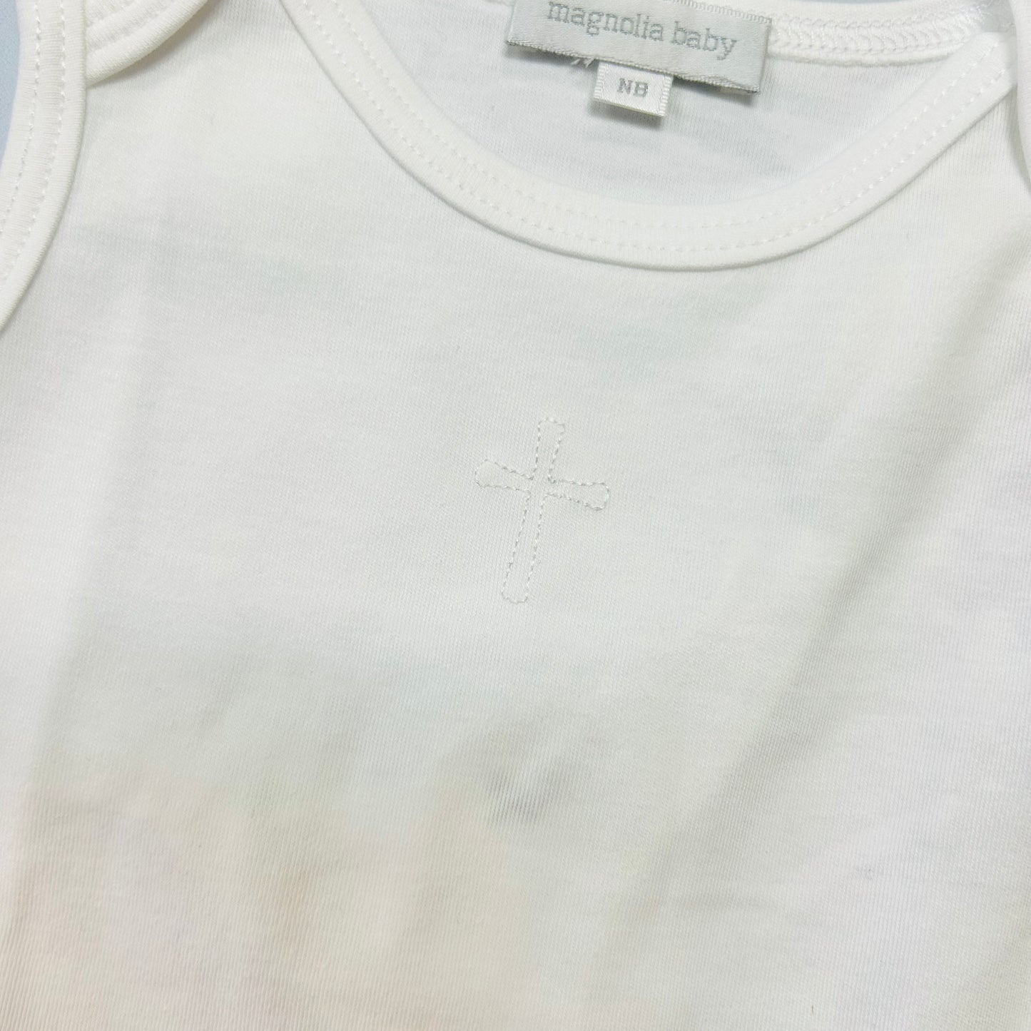 Magnolia Baby Cross Embroidered Onesie